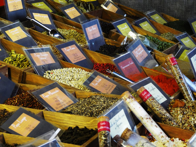 spices being sold at the outdoor food market in turin 