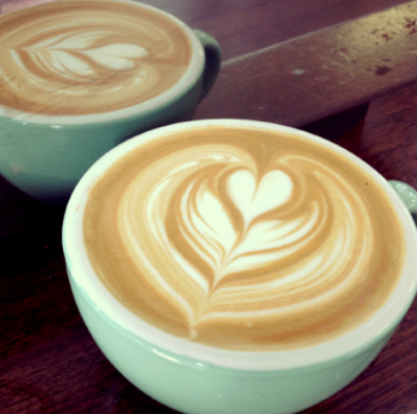 lavazza coffee - coffee art with cappuccino and heart shape design in center