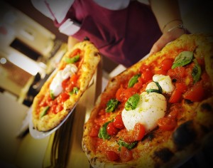 delicious pizza in turin - Pizzeria Cammafa photo of fresh pizza with tomatoes and cheese 