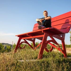 Chris Bangle on original red Big Bench in Piedmont