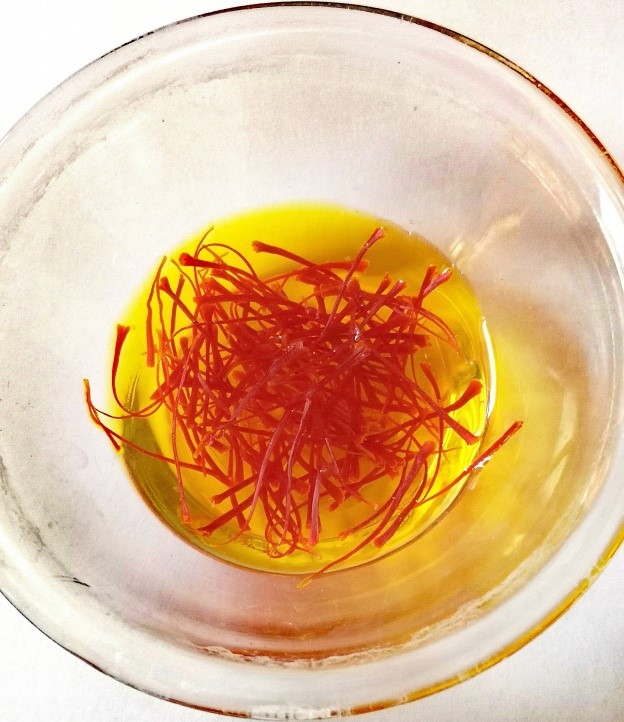 Saffron threads soaking in bowl