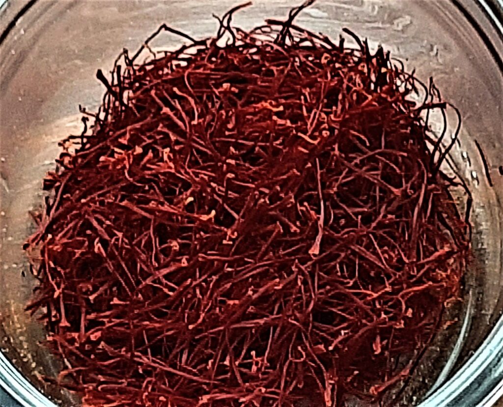 saffron threads in a glass jar